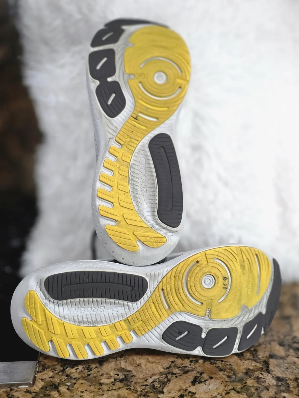 Brooks White & Gray Running Shoes with Blue & Yellow Accents